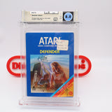 DEFENDER - EARLY HANGTAB BLUE BOX! WATA GRADED 8.0! NEW & UNOPENED! (Atari 2600)