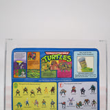 GENERAL TRAAG - 1989 PLAYMATES - AFA GRADED 70+ EX+ NEW Authentic & Factory Sealed! (Vintage TMNT Figure)