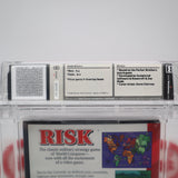 RISK - CLAMSHELL CASE VERSION! WATA GRADED 9.4 A++! NEW & Factory Sealed! (Sega Genesis)