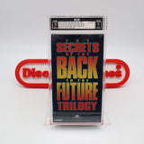 THE SECRETS OF THE BACK TO THE FUTURE TRILOGY - IGS GRADED 9 BOX & 8 SEAL! NEW & Factory Sealed with Authentic V-Overlap Seam! (VHS)