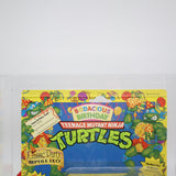 BODACIOUS BIRTHDAY: CLASSIC PARTY REPTILE LEO / LEONARDO - 1992 PLAYMATES - AFA GRADED 80 NEW Authentic & Factory Sealed! (Vintage TMNT Figure)