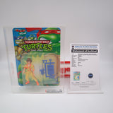 APRIL O'NEIL (ORANGE/BLUE STRIPES) - 1993 PLAYMATES - CAS GRADED 80 NEW Authentic & Factory Sealed! (Vintage TMNT Figure)