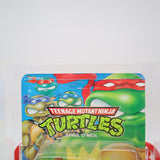 APRIL O'NEIL (ORANGE/BLUE STRIPES) - 1993 PLAYMATES - CAS GRADED 80 NEW Authentic & Factory Sealed! (Vintage TMNT Figure)